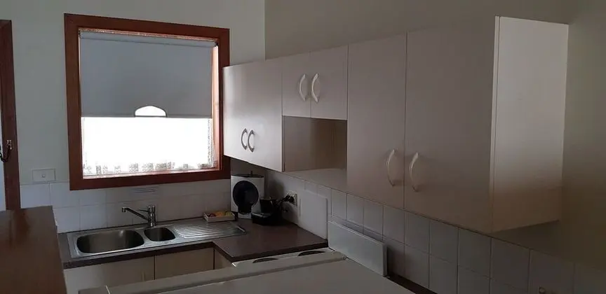 Colonial Motel and Serviced Apartments - Mutfak