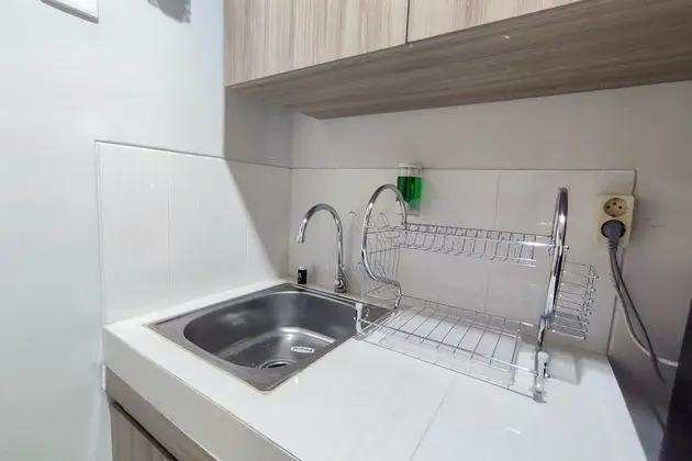 Comfort 1Br At Amartha View Apartment - Mutfak