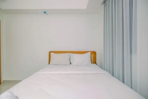 Comfort 1BR Apartment at Evenciio Margonda - Öne Çıkan Resim
