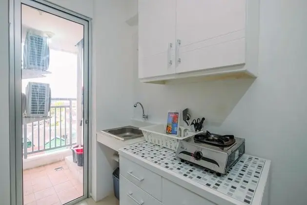Comfort 2Br With City View Bassura City Apartment - Mutfak