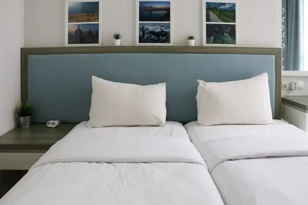 Comfort and Elegant 1BR at Gold Coast Apartment - Oda