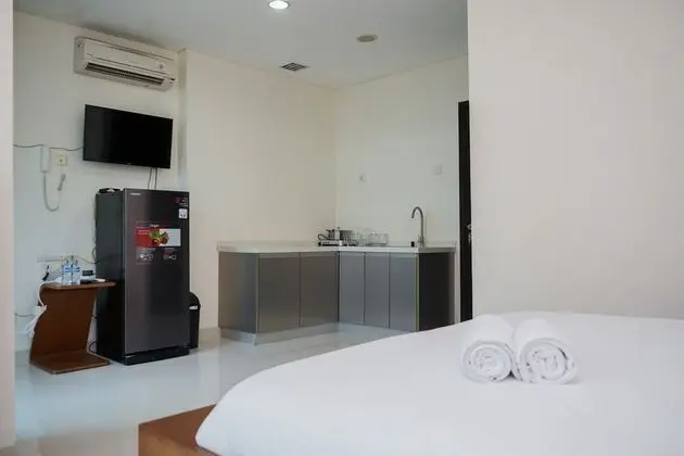 Comfort And High Floor Studio At Brooklyn Alam Sutera Apartment - Oda