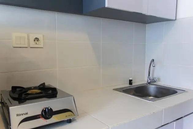 Comfort And Simply Studio Apartment At Scientia Residence - Mutfak