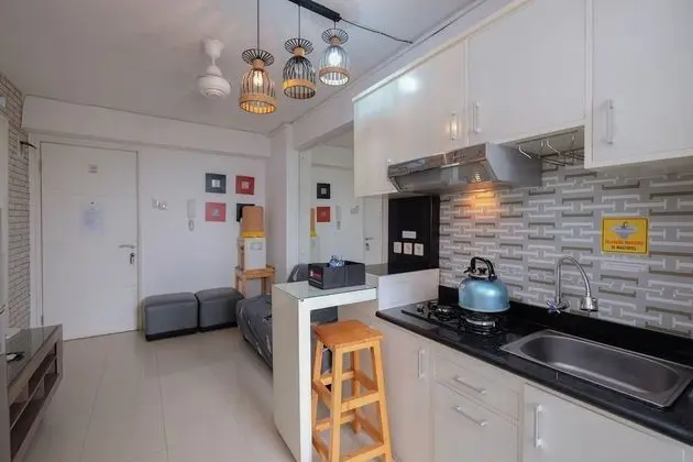 Comfort And Warm 2Br At Bassura City Apartment - Mutfak
