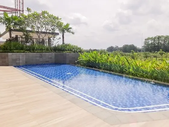 Comfortable 1BR Apartment at Marigold Nava Park