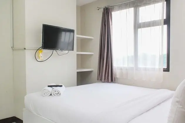 Comfortable and Cozy Living 2BR at Lagoon Apartment - Oda