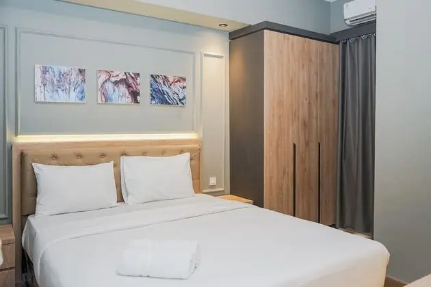 Comfortable and Homey 2BR Apartment at M-Town Residence - Öne Çıkan Resim