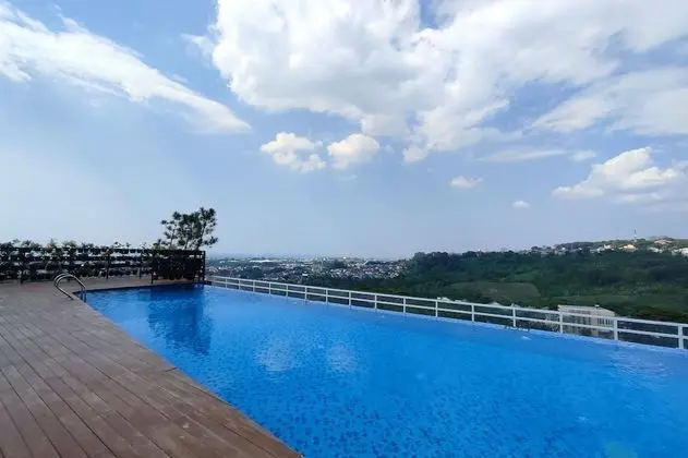 Comfortable And Modern 1Br Without Living Room At Amartha View Apartment