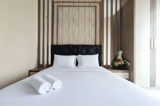 Comfortable And Modern 1Br Without Living Room At Amartha View Apartment - Oda
