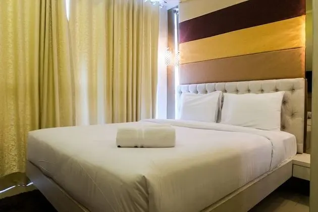 Comfortable Premiere 1BR at The Oasis Apartment