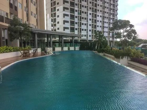 Comfortable Premiere 1BR at The Oasis Apartment
