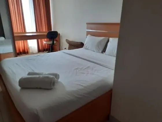 Comfy And Homey Studio Room At Grand Kamala Lagoon Apartment