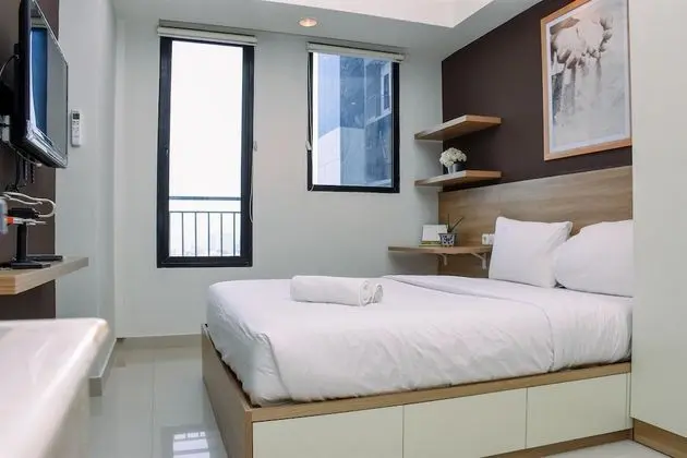 Comfy Studio Room at Evenciio Margonda Apartment