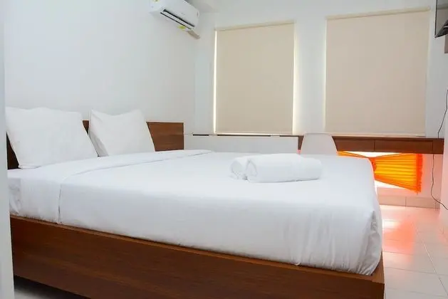 Comfy Studio Room at Patraland Urbano Apartment