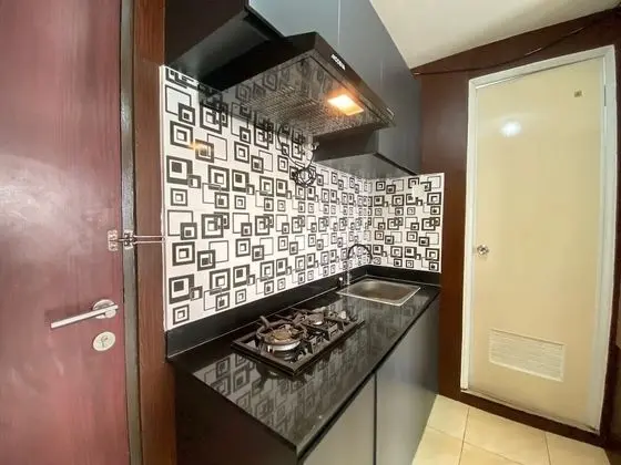 Comfy & Well Appointed 2BR at Tamansari Panoramic Apartment - Mutfak