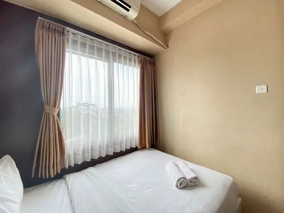 Comfy & Well Appointed 2BR at Tamansari Panoramic Apartment - Oda