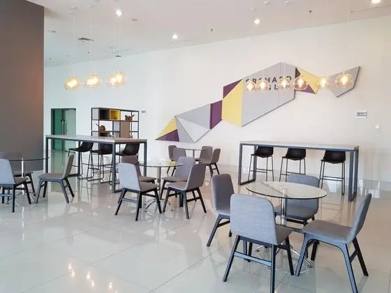 Compact And Cozy Studio Apartment At Orchard Supermall Mansion - Lobi
