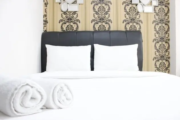 Compact Studio Room at Sudirman Suites Apartment