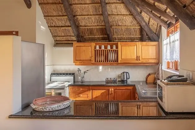 Coral Tree Cottages - Mutfak