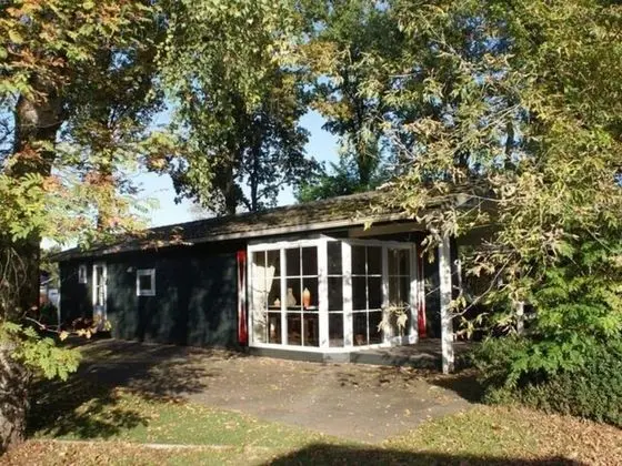 Cosy Forest Chalet in Voorthuizen With Indoor and Outdoor Pool