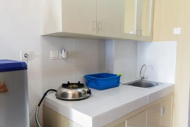 Cozy 1BR at Scientia Residence Apartment - Mutfak