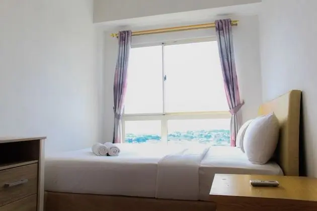 Cozy 1BR at Scientia Residence Apartment - Oda