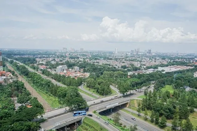 Cozy 2BR Apartment at Tuscany Residences With Garden View