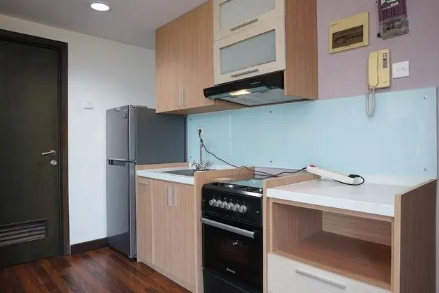 Cozy Living 1BR Tamansari The Hive Apartment - Mutfak