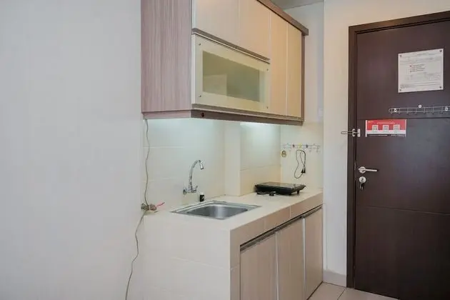 Cozy Living Studio At Saveria Apartment - Mutfak