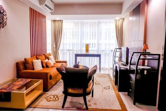 Cozy Pool View Kemang Village Residence Apartment with Direct Access to Mall