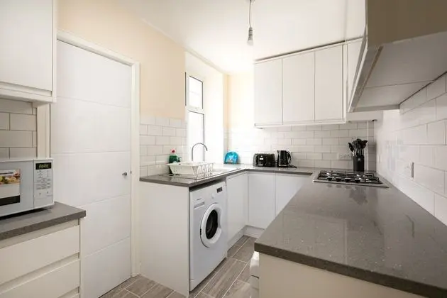 Cozy Skyvillion Apartment - Mutfak