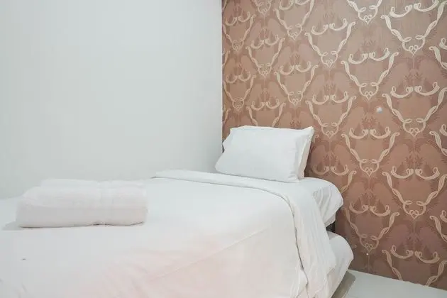 Cozy Stay at 2BR Green Pramuka Apartment near Shopping Center