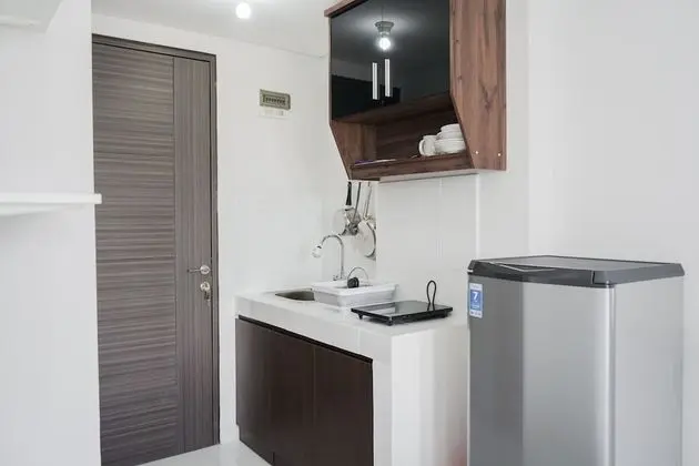 Cozy Studio at Amazana Serpong Apartment - Mutfak