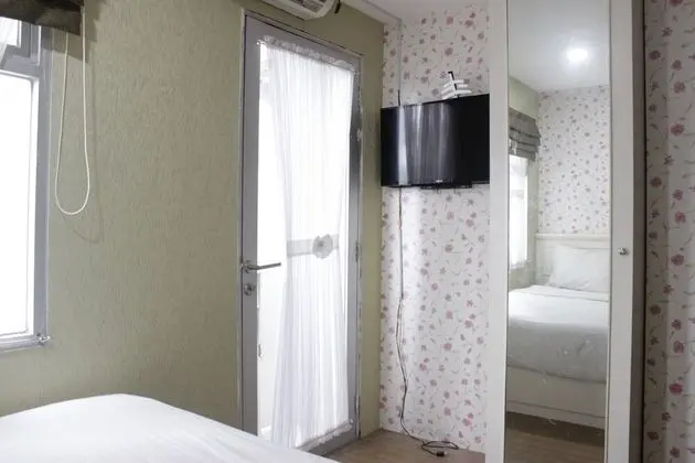 Cozy Studio Apartment At Grand Asia Afrika - İç Mekan