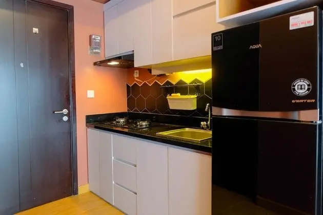Cozy Studio at Casa De Parco Apartment - Mutfak
