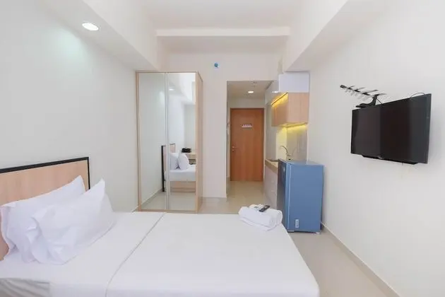 Cozy Studio at Evenciio Apartment near UI