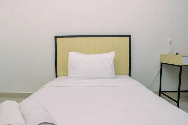 Cozy Studio with Single Bed at Evenciio Margonda Apartment