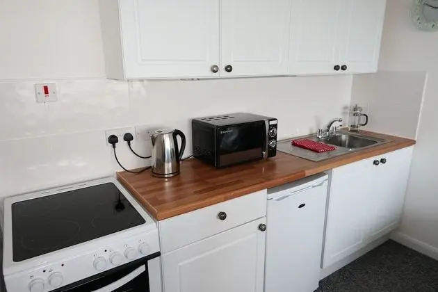 Devoncoast Seaview Apartments - Mutfak