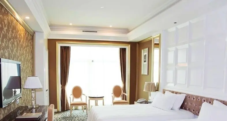 Dongguan Silver Holiday Hotel - Oda