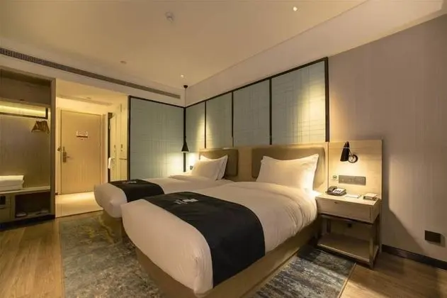 Echarm Hotel Xiamen Exhibition Center - Oda