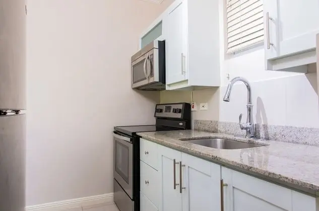 Eight 24 by Pro Homes Jamaica - Mutfak