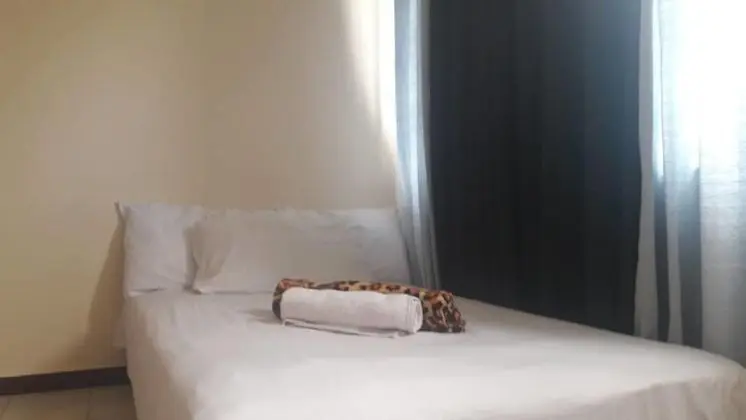 Ekonumi Rooms at Benrosi Plaza - Oda