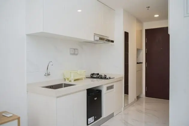 Elegant And Comfy Studio Room At Sky House Bsd Apartment - Mutfak