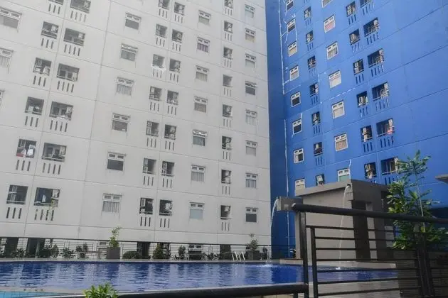 Elegant And Well Designed 2Br At Green Pramuka City Apartment