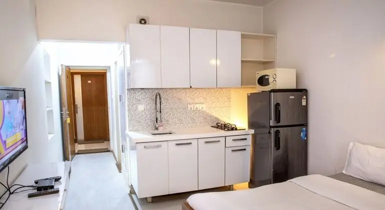 Emkay Apartment Guest House - Mutfak