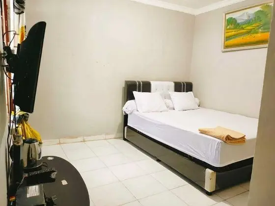 EXPRESS O 91277 Atiq Homestay Syariah - Oda