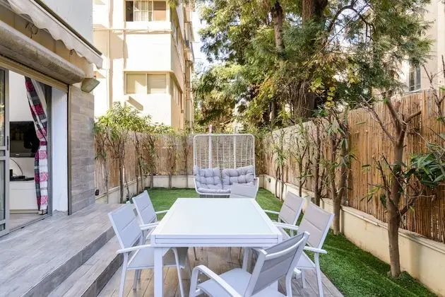Family Apt & Private Garden near Beach by FeelHome