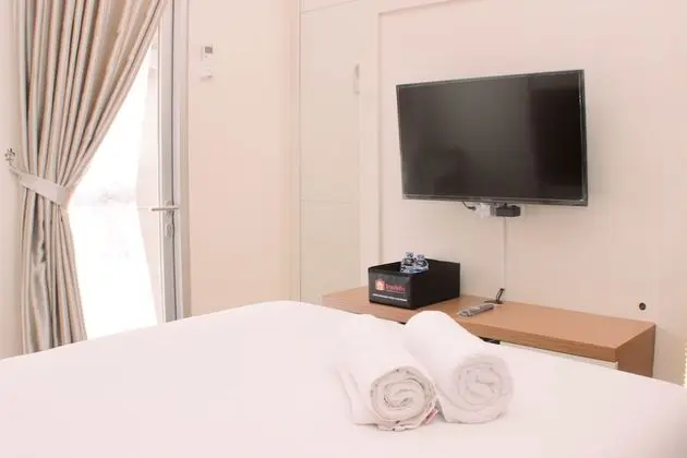 Fancy And Comfy Studio Apartment At Transpark Juanda Bekasi
