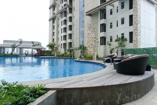 Fully Furnished Apartment with Comfortable Design 2BR Vittoria Residence