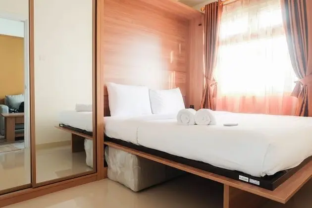 Fully Furnished and Comfortable 2BR Green Pramuka Apartment - Öne Çıkan Resim